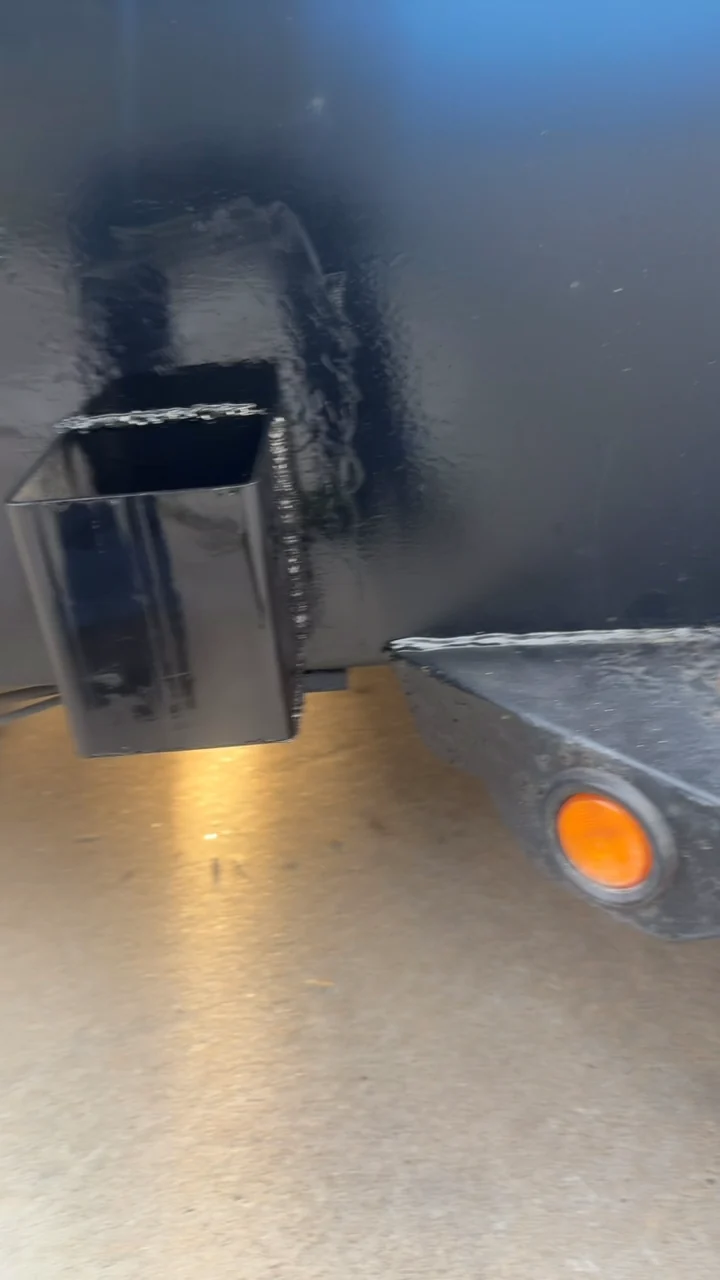Custom pocket on the black utility trailer, view two