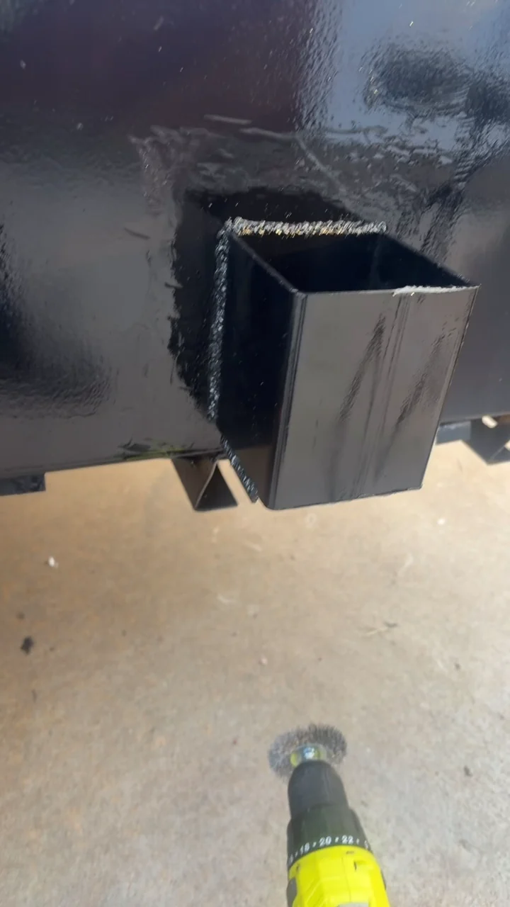 Another view of the custom pockets attached to the black utility trailer
